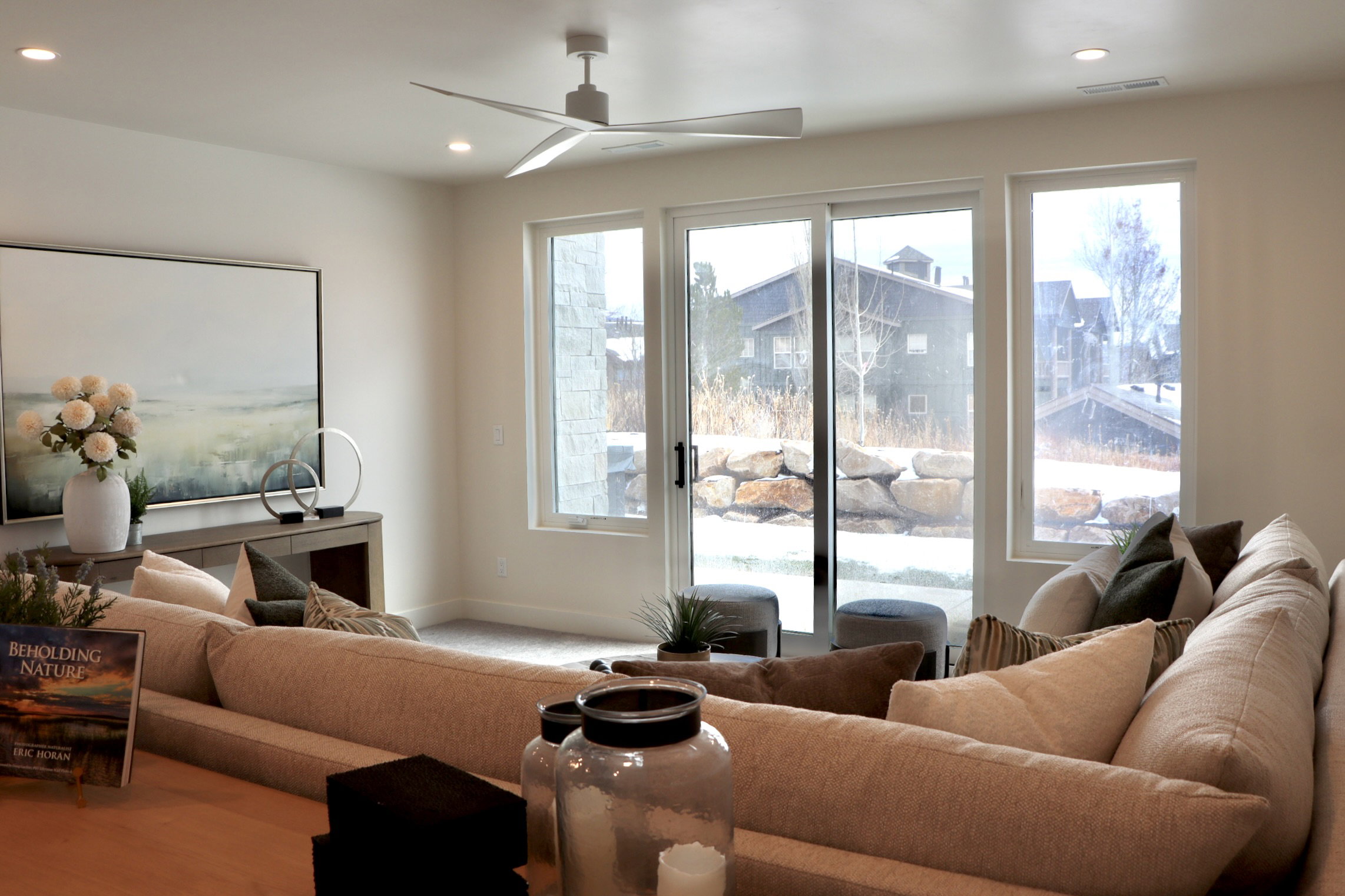 Living room featuring a ceiling fan, recessed lighting, and wood finished floors