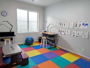 Bedroom 4 has served as a fun-filled playroom for the grandkids. It’s a comfortable, medium-sized room with a generously sized closet. You’ll notice the current colorful foam floor tiles, perfect for little ones.
