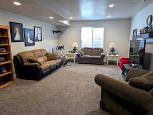 Downstairs, the basement family room offers a vast and inviting space for relaxation and entertainment. The nine-foot foundation is a game-changer, creating higher ceilings that lend an airy, open feel throughout the entire basement.