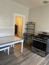 Dining area with light wood-type flooring