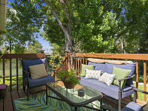 Wooden terrace with an outdoor hangout area