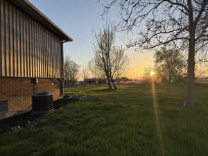 View of yard with central AC