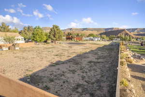 View of yard featuring a mountain view