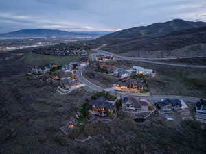 Birds eye view of property with a mountain view