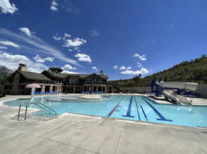Community pool with a water slide