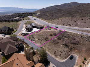 Drone / aerial view featuring a residential view and a mountain view