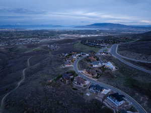 Birds eye view of property with a mountain view