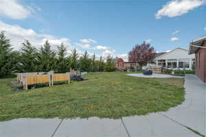 View of yard featuring fence