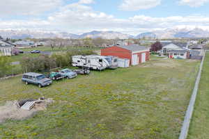 Birds eye view of property featuring a mountain view and a residential view