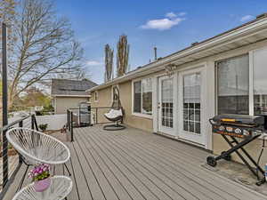 Deck view with living room entry access.