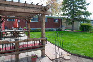 View of patio with a pergola, fence private yard, and outdoor dining area