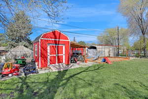 View of shed with fence