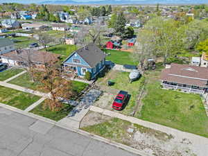 Birds eye view of property featuring a residential view and a mountain view