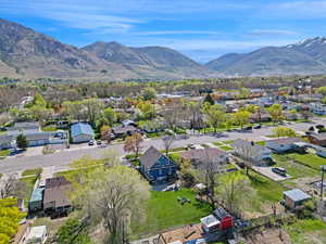 Birds eye view of property featuring a residential view and a mountain view