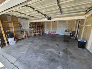 Garage with a garage door opener with Double door out the back
