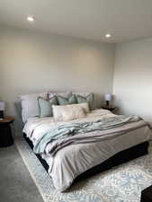 Bedroom with carpet flooring and recessed lighting