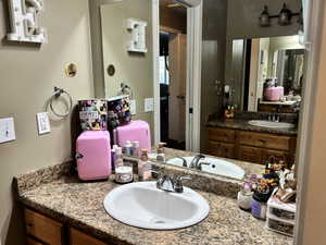 Bathroom featuring double vanity