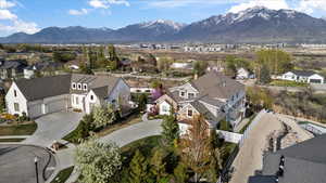 Aerial view featuring a mountain view and a residential view