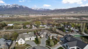 Drone / aerial view with a residential view and a mountain view