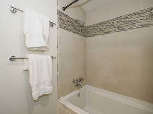 Bathroom with bathing tub / shower combination