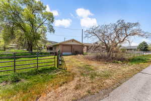 View of front of house with fence