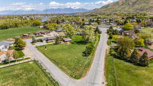 Drone / aerial view featuring a residential view and a water and mountain view