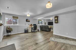 Lower level office & family room. Space for 2nd kitchen is here.