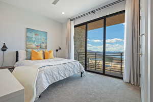 Bedroom with recessed lighting, access to exterior, carpet flooring, and visible vents