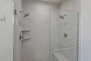 Full bath featuring a stall shower