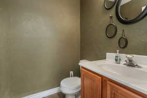 Bathroom featuring toilet and vanity