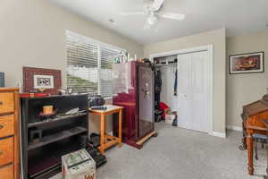 Misc room featuring visible vents, carpet flooring, baseboards, and ceiling fan