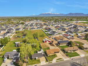 Drone / aerial view with a residential view and a mountain view