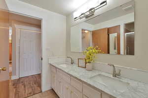 Bathroom has tub/shower and an additional shower.  Could be divided into two bathrooms.