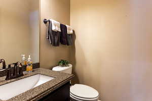 Bathroom featuring toilet and vanity