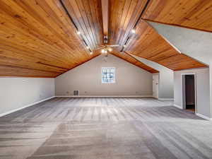 Bonus room with pitched wood ceiling.