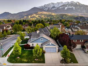 Drone / aerial view with a residential view and a mountain view