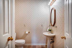Half bathroom off of upstairs bonus room.