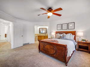 Main floor primary bedroom with ensuite bathroom.