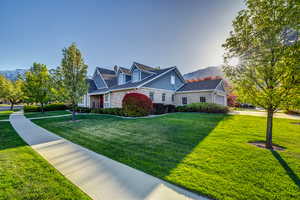 Front view of property with side garage