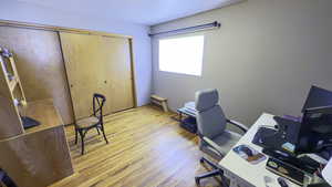 Office featuring light wood flooring