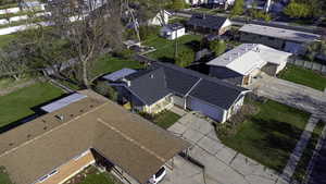 Birds eye view of property with a residential view