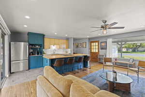 Kitchen featuring light countertops and recessed lighting.