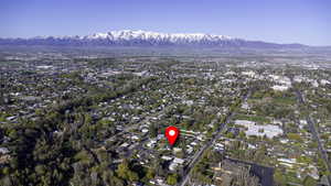 Birds eye view of property with a mountain view