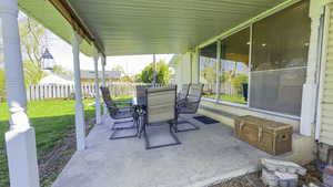 View of patio / terrace with a fenced backyard and outdoor dining space