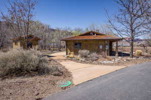View of property exterior with a  metal roof