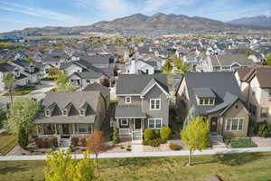 Birds eye view of property featuring a residential view and a mountain view
