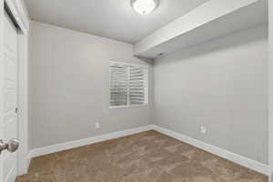 Interior space with visible vents, baseboards, and a textured ceiling