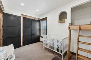 Bedroom with baseboards, carpet, and recessed lighting