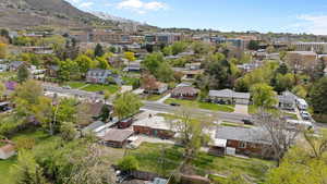 Drone / aerial view with a residential view and a mountain view
