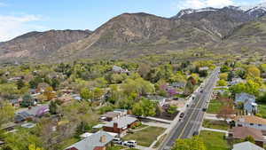 Drone / aerial view featuring a residential view and a mountain view